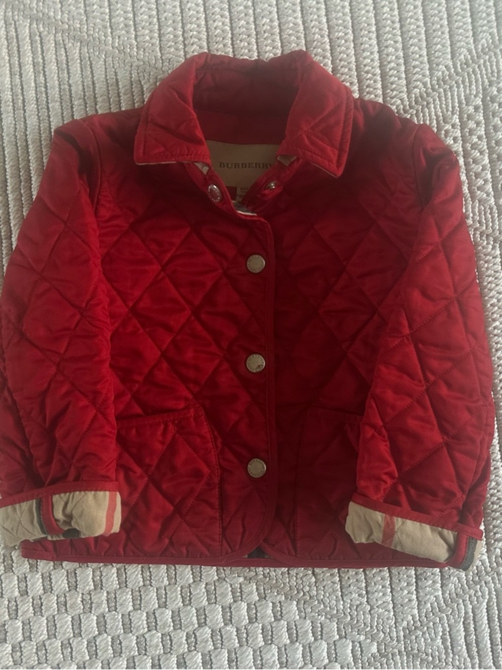 Burberry Kids Red Quilted Puffer Jacket with Check Cuff Detail